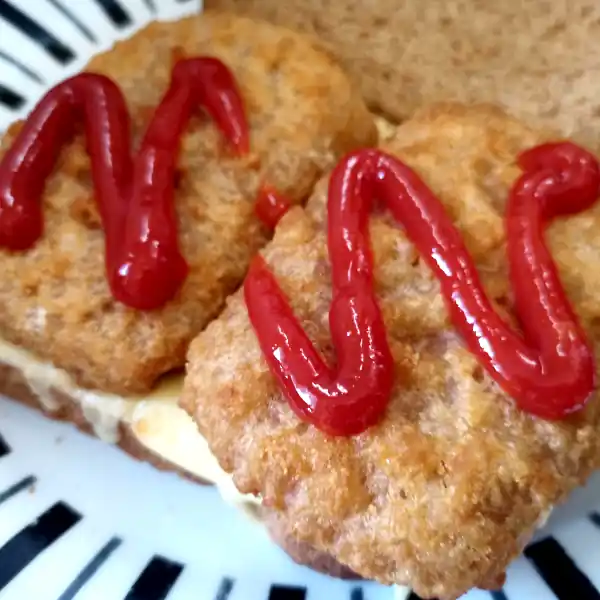 cooked spam fritters in the air fryer served with ketchup