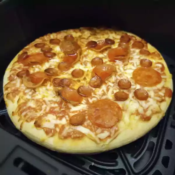 Frozen deep pan pizza in the air fryer